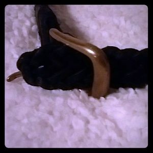 Black braided belt with metal buckle